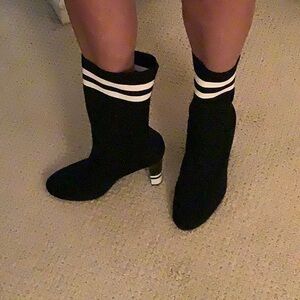 Black fabric boot with white stripe accent. Excellent condition.